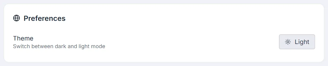 Preferences card — Theme row with a Light / Dark toggle button